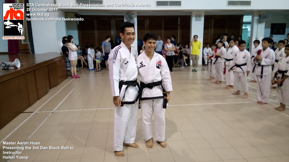 Haikel Yusop Senior Instructor Promoted 3rd 4th Dan Black Belt Presentation STA Centralised Grading Singapore Taekwon-do Academy HQ Taekwondo