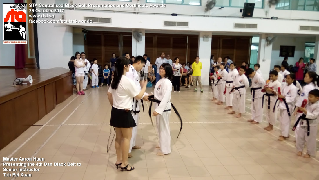 Toh Pei Xuan Senior Instructor Promoted 3rd 4th Dan Black Belt Presentation STA Centralised Grading Singapore Taekwon-do Academy HQ Taekwondo