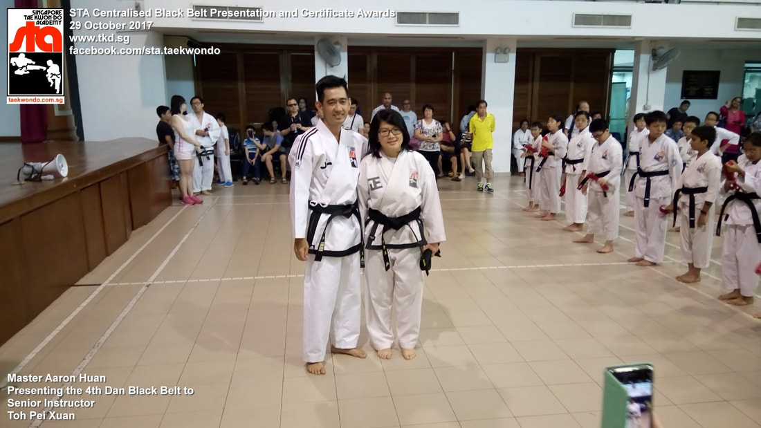 Toh Pei Xuan Senior Instructor Promoted 3rd 4th Dan Black Belt Presentation STA Centralised Grading Singapore Taekwon-do Academy HQ Taekwondo