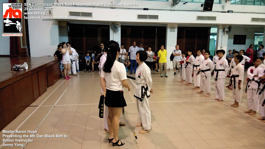 Jenny Yong Senior Instructor Promoted 3rd 4th Dan Black Belt Presentation STA Centralised Grading Singapore Taekwon-do Academy HQ Taekwondo