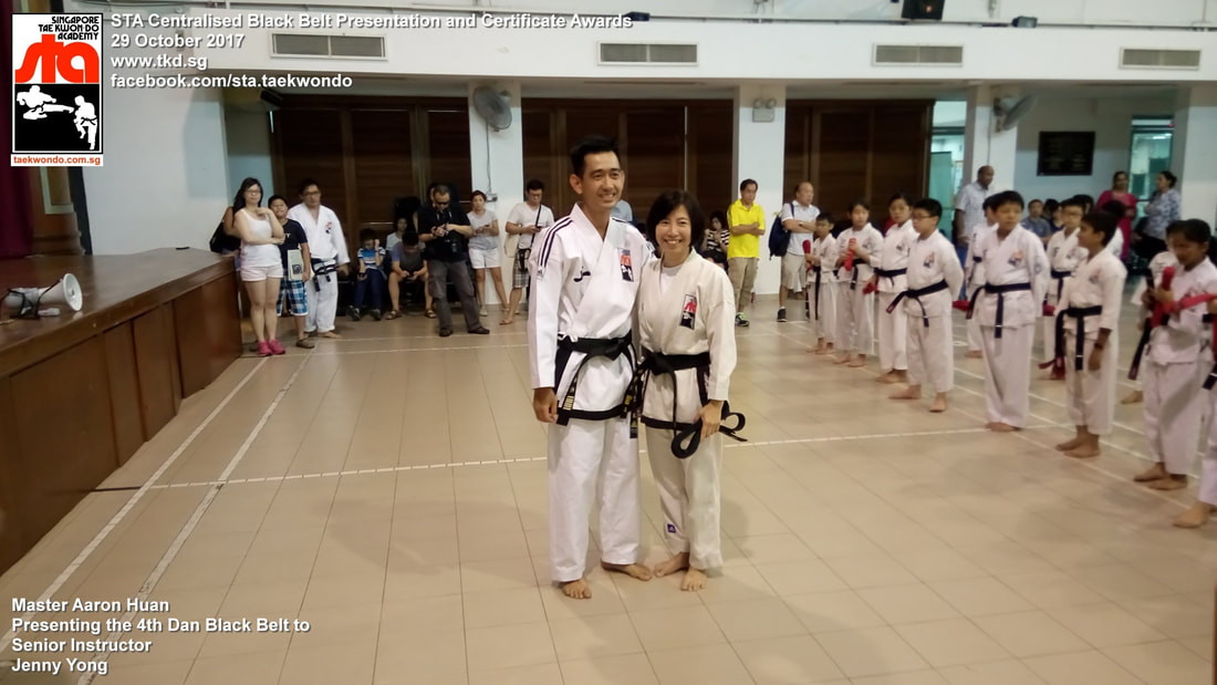 Jenny Yong Senior Instructor Promoted 3rd 4th Dan Black Belt Presentation STA Centralised Grading Singapore Taekwon-do Academy HQ Taekwondo