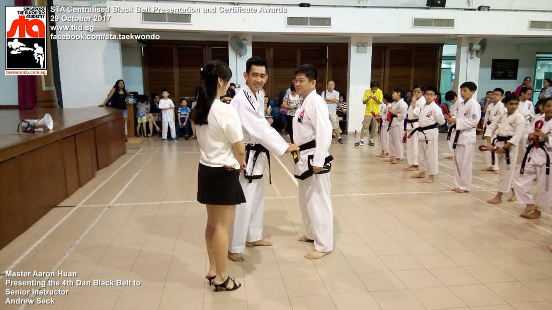 Andrew Seck Senior Instructor Promoted 3rd 4th Dan Black Belt Presentation STA Centralised Grading Singapore Taekwon-do Academy HQ Taekwondo