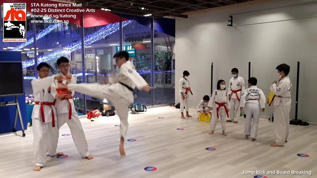 Jump Kick Board Breaking Lesson Children Kids Teens Katong Kinex Paya Lebar PLQ Sims Haig Singapore Taekwondo Academy TKD STA