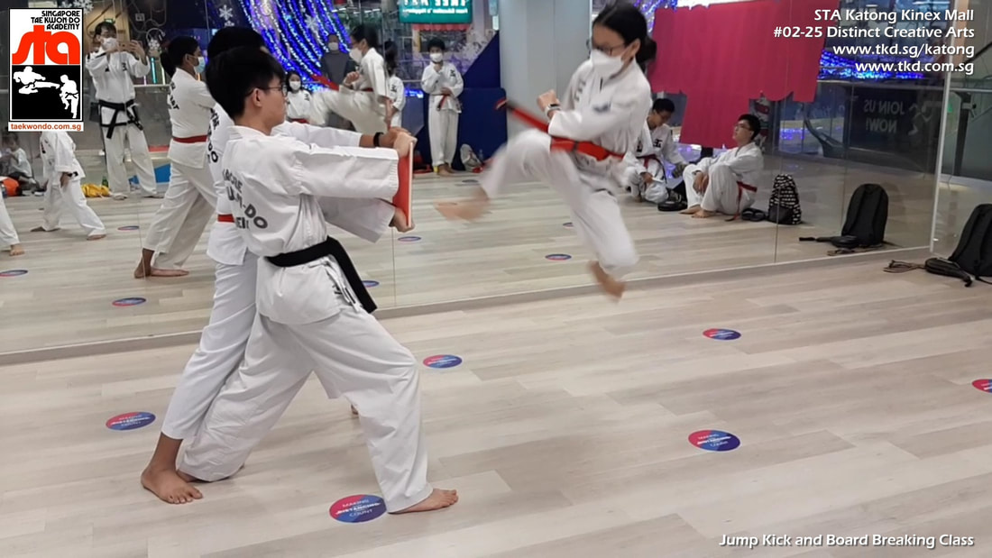 Kids Jump Kick Board Breaking Lesson Children Teens Katong Kinex Paya Lebar PLQ Sims Haig Singapore Taekwondo Academy TKD STA
